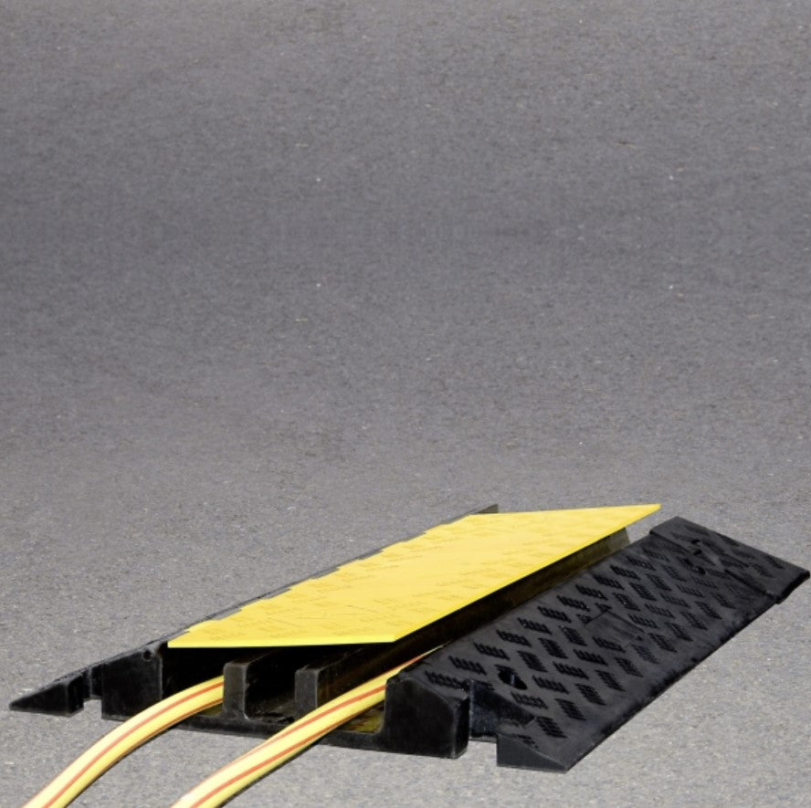 Protège-câbles XL extrêmement résistant jaune et noir.